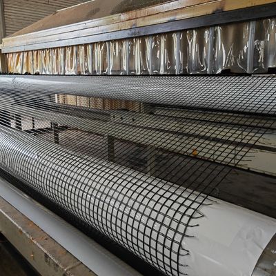 100-100kn Γεωγραφικά δίκτυα υψηλής αντοχής σε έλξη για την ενίσχυση του ασφαλτοστρωτήρα σε κίτρινο